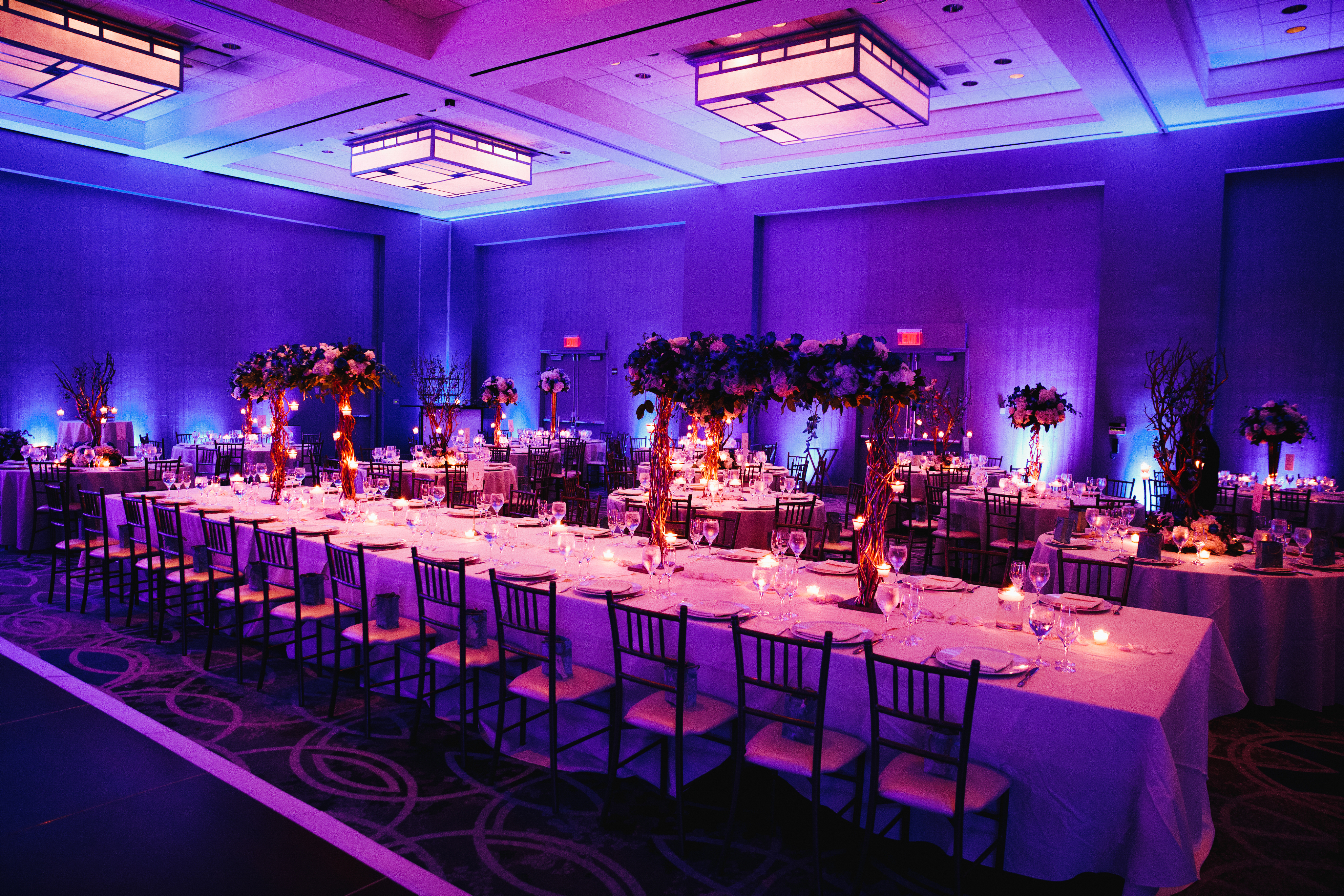 A grand banquet hall with decorated tables